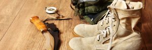 Hunting boots, backpack, and knife