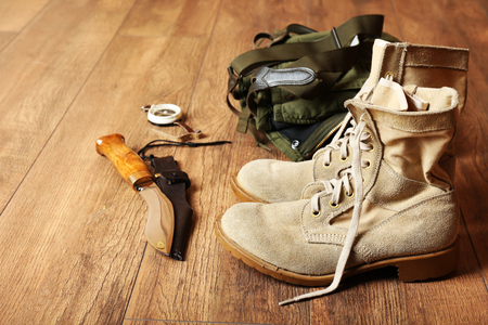 Hunting boots, backpack, and knife