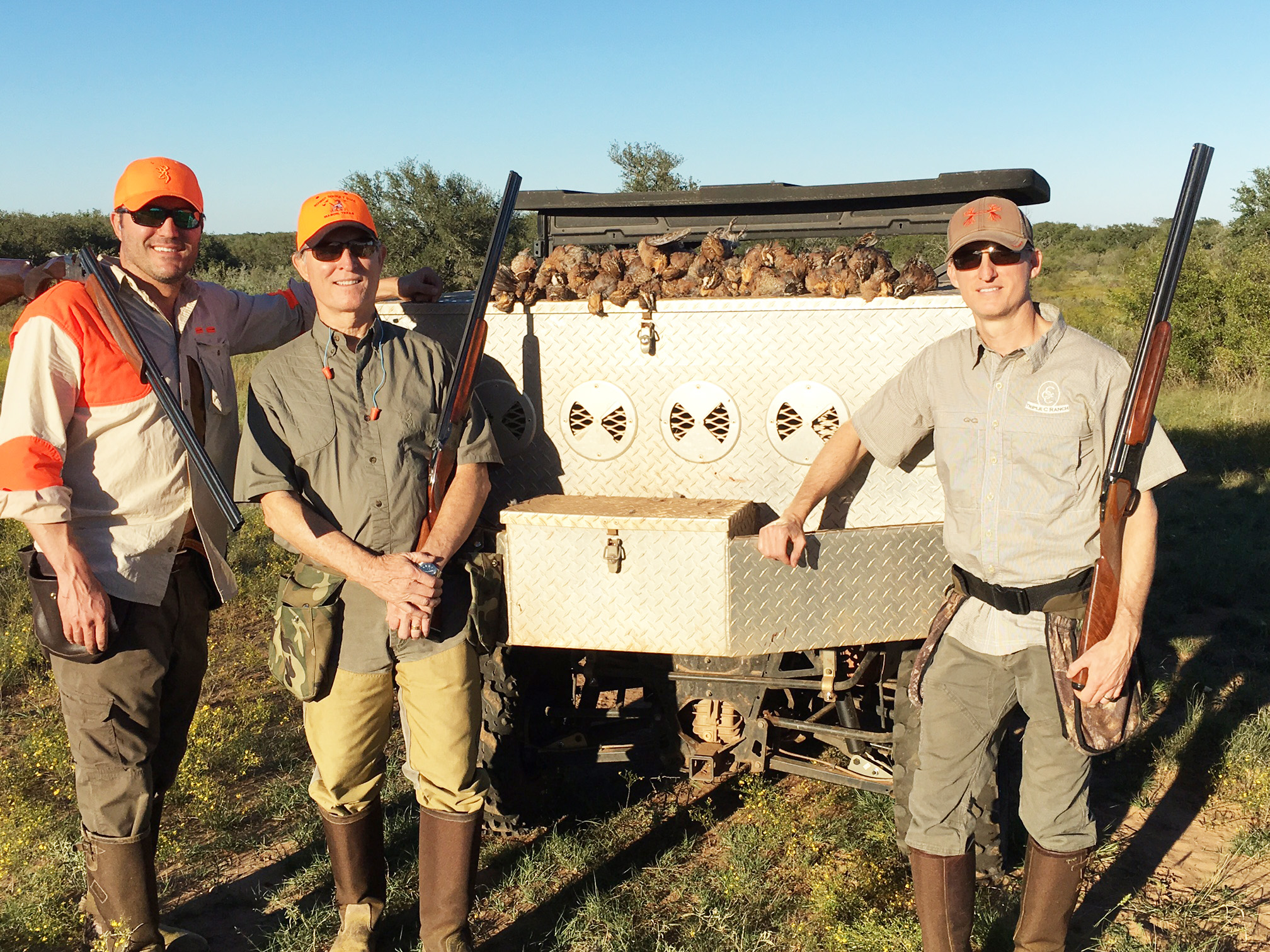 three quail hunters in Texas